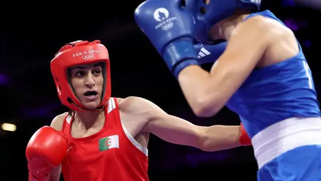 Imane Khelif on the left and Angela Carini during their match 